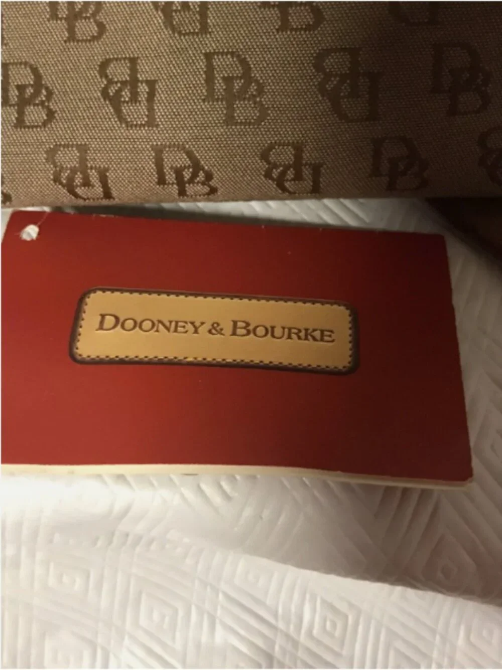 VINTAGE DOONEY AND BOURKE SIGNATURE TASSEL CANVAS LEATHER SHOULDER BAG
